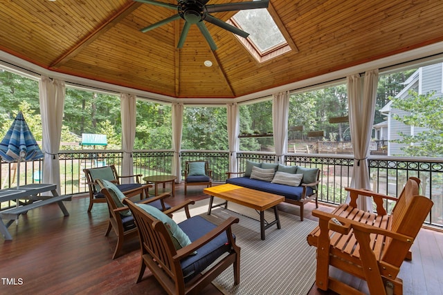 7908 Mayapple Pl, Raleigh, NC 27613 - sunroom featuring an outdoor hangout area, ceiling fan, lofted ceiling, and a skylight