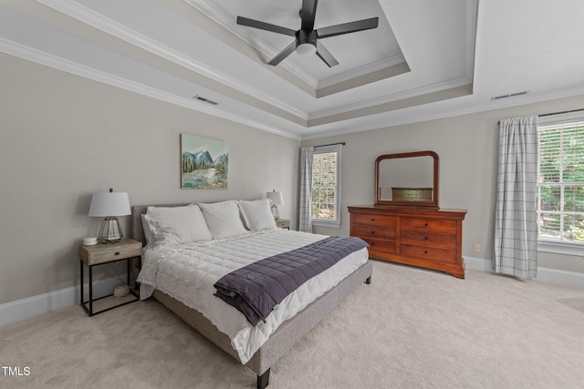 7908 Mayapple Pl, Raleigh, NC 27613 - bedroom with a raised ceiling, ornamental molding, light carpet, and ceiling fan