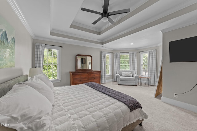 7908 Mayapple Pl, Raleigh, NC 27613 - bedroom with crown molding, multiple windows, light colored carpet, a raised ceiling, and ceiling fan