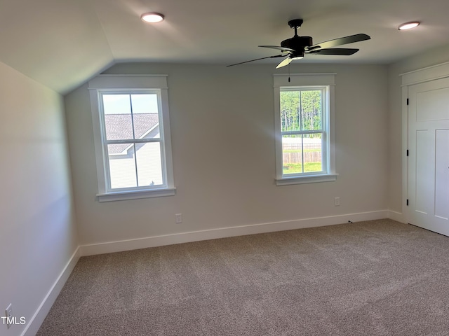 163 Noramac Ct, Selma, NC 27576 - empty room with vaulted ceiling, carpet, healthy amount of natural light, and a ceiling fan