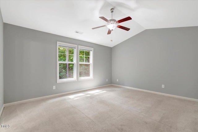 205 Willow Ridge Dr, Louisburg, NC 27549 - empty room featuring light colored carpet, ceiling fan, and vaulted ceiling