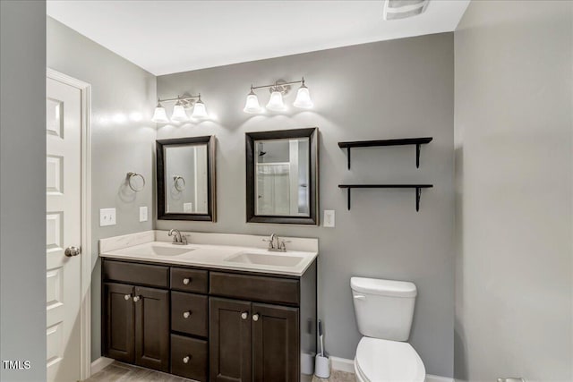 205 Willow Ridge Dr, Louisburg, NC 27549 - bathroom featuring double vanity and toilet