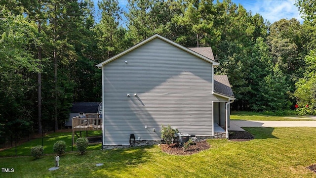 205 Willow Ridge Dr, Louisburg, NC 27549 - view of home's exterior featuring a yard and a wooden deck