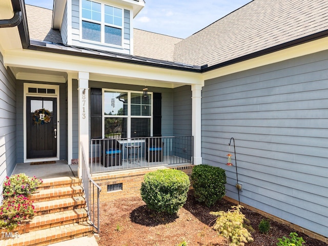 8713 Halsey Ln, Wake Forest, NC 27587 - property entrance featuring covered porch and a shingled roof