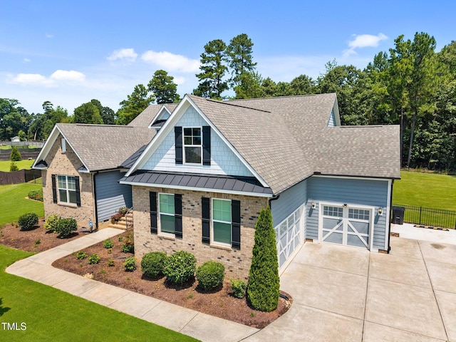 8713 Halsey Ln, Wake Forest, NC 27587 - craftsman-style home featuring driveway, brick siding, roof with shingles, a standing seam roof, and a garage
