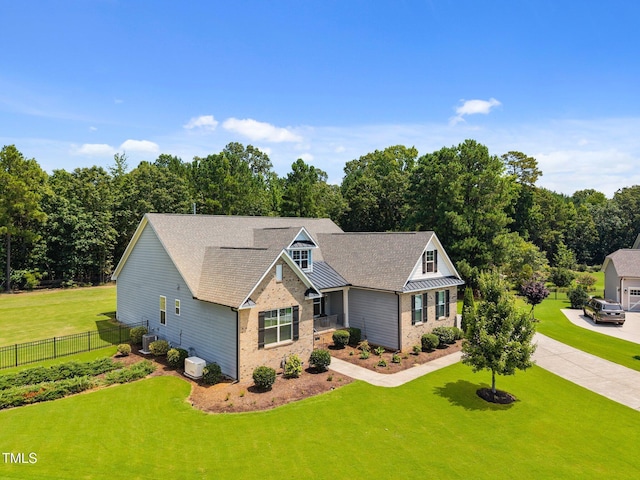 8713 Halsey Ln, Wake Forest, NC 27587 - craftsman inspired home with concrete driveway, brick siding, and roof with shingles