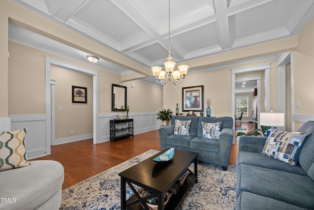8713 Halsey Ln, Wake Forest, NC 27587 - living room featuring a chandelier, coffered ceiling, wood finished floors, beamed ceiling, and wainscoting