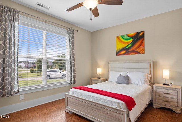 8713 Halsey Ln, Wake Forest, NC 27587 - bedroom with wood finished floors and ceiling fan