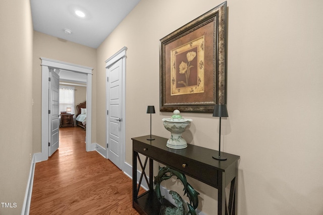 8713 Halsey Ln, Wake Forest, NC 27587 - corridor featuring wood finished floors and baseboards