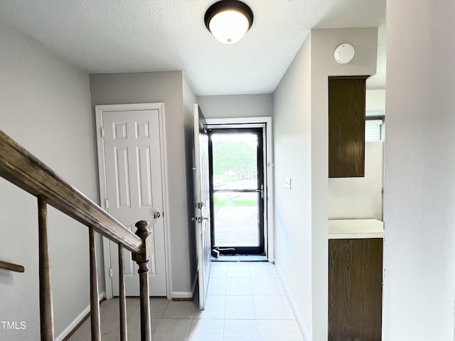 2206 Alpine Rd, Durham, NC 27707 - foyer with light tile patterned flooring and a textured ceiling