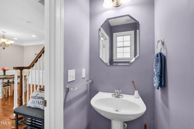 2506 Happy Ln, Raleigh, NC 27614 - bathroom with a chandelier and crown molding