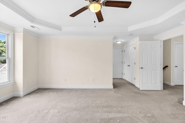 2506 Happy Ln, Raleigh, NC 27614 - carpeted spare room with ornamental molding, a raised ceiling, and ceiling fan