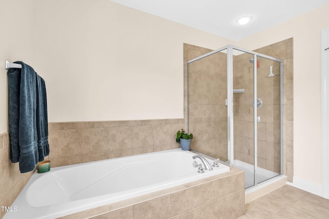 2506 Happy Ln, Raleigh, NC 27614 - bathroom with a garden tub, a stall shower, and tile patterned floors