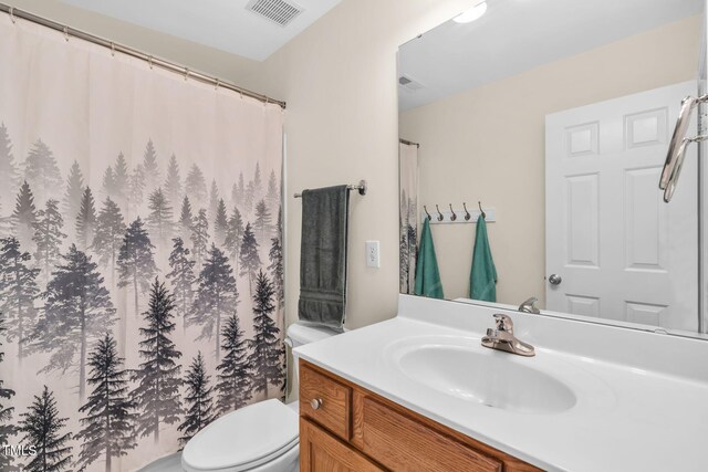 2506 Happy Ln, Raleigh, NC 27614 - bathroom featuring vanity and a shower with shower curtain