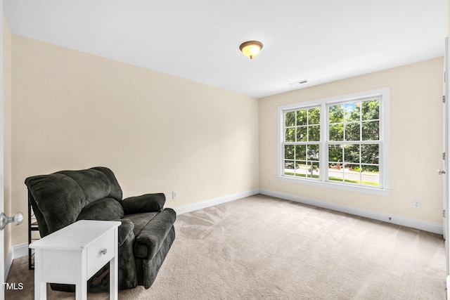2506 Happy Ln, Raleigh, NC 27614 - living area with carpet flooring and baseboards