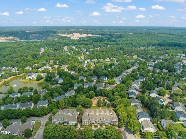 2506 Happy Ln, Raleigh, NC 27614 - aerial view of residential area with a large body of water and a heavily wooded area