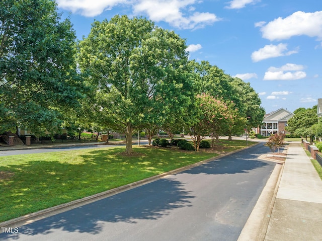 2506 Happy Ln, Raleigh, NC 27614 - view of front facade with a front lawn