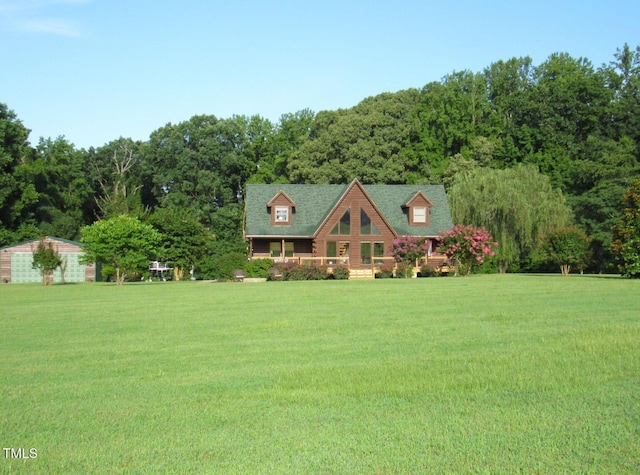 1159 Flemingtown Rd, Henderson, NC 27537 - log home with a front yard and a forest view