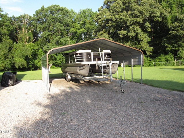 1159 Flemingtown Rd, Henderson, NC 27537 - view of parking / parking lot featuring a carport and gravel driveway