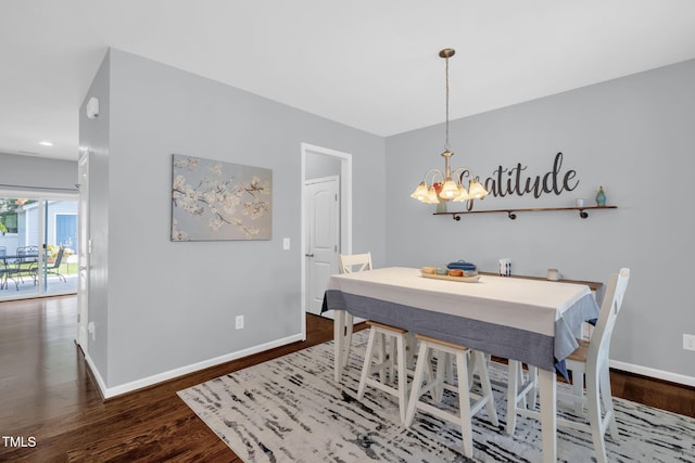 3716 Landshire View Ln, Raleigh, NC 27616 - dining room featuring dark wood-style flooring and a chandelier
