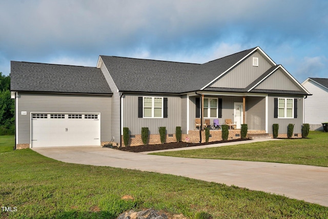 9448 S Beaver Creek Way, Middlesex, NC 27557 - view of front of property featuring a garage, covered porch, driveway, and a shingled roof