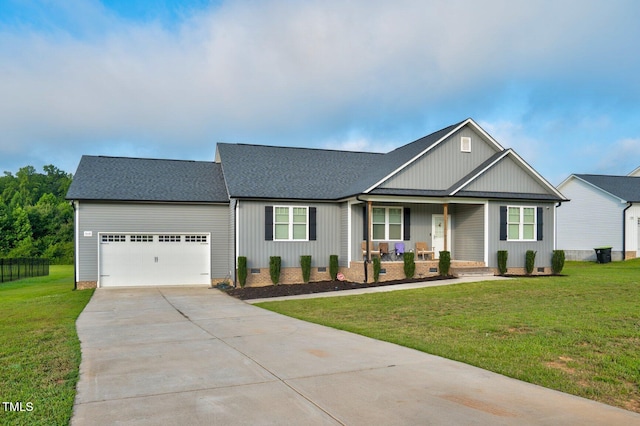 9448 S Beaver Creek Way, Middlesex, NC 27557 - view of front of home featuring covered porch, a garage, driveway, a shingled roof, and crawl space