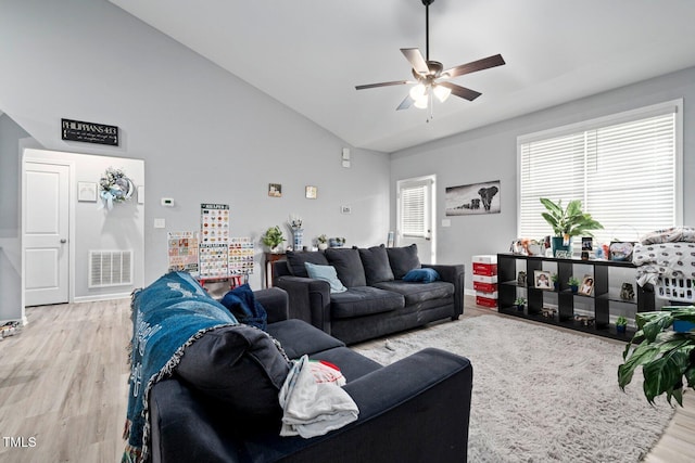 9448 S Beaver Creek Way, Middlesex, NC 27557 - living area with wood finished floors, a ceiling fan, and high vaulted ceiling