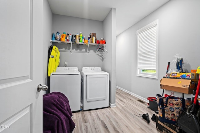 9448 S Beaver Creek Way, Middlesex, NC 27557 - laundry room with washing machine and clothes dryer and wood finished floors