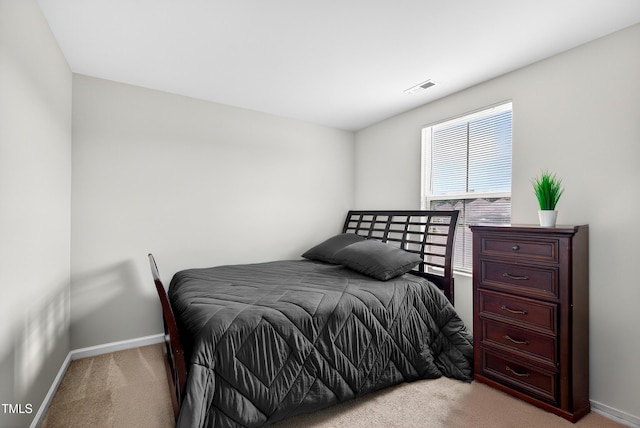 3 Windchime Ct, Durham, NC 27704 - bedroom with light colored carpet and baseboards