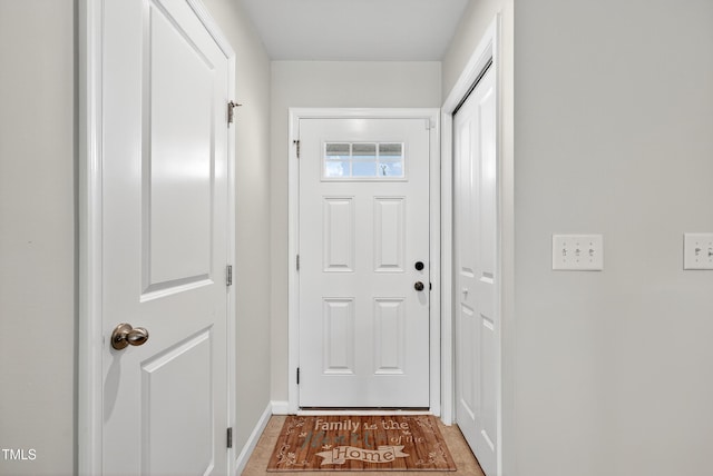 3 Windchime Ct, Durham, NC 27704 - doorway to outside featuring baseboards and light wood finished floors