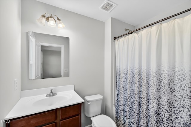 3 Windchime Ct, Durham, NC 27704 - bathroom featuring vanity and toilet
