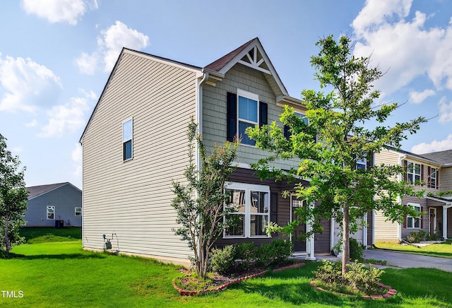 3 Windchime Ct, Durham, NC 27704 - view of front facade featuring a front yard and asphalt driveway