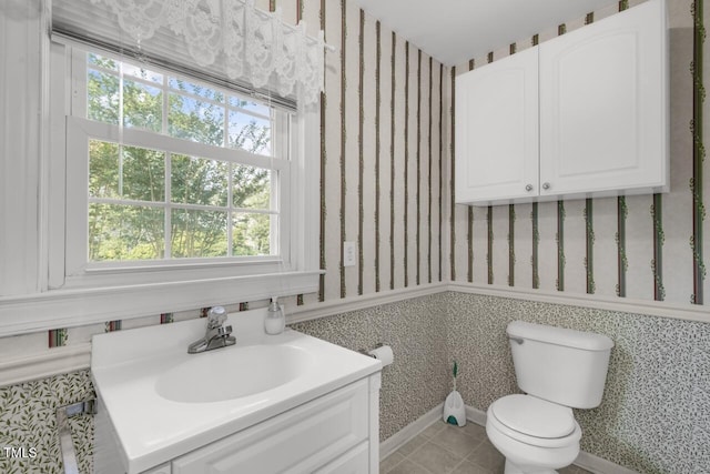216 S Faison Ave, Faison, NC 28341 - bathroom with wallpapered walls, vanity, and tile patterned floors