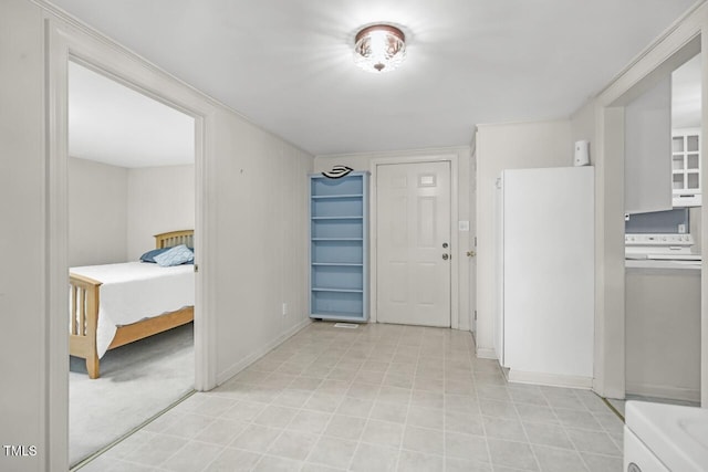 216 S Faison Ave, Faison, NC 28341 - entryway with washer / dryer and baseboards