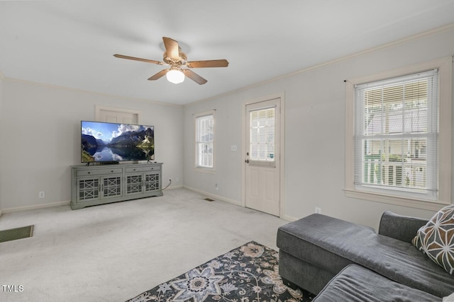 216 S Faison Ave, Faison, NC 28341 - living area with a ceiling fan, carpet, and ornamental molding
