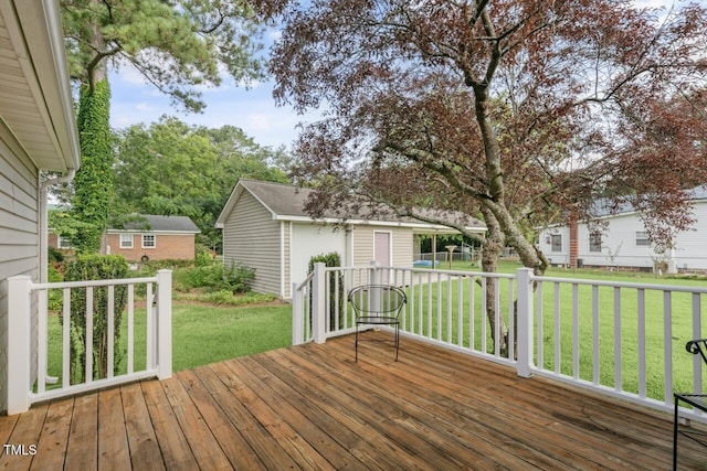 216 S Faison Ave, Faison, NC 28341 - wooden terrace featuring an outbuilding and a yard