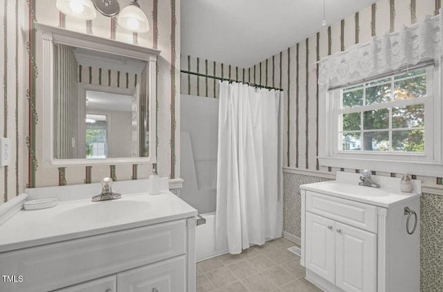 216 S Faison Ave, Faison, NC 28341 - full bath featuring wallpapered walls, vanity, shower / bath combo, and tile patterned flooring