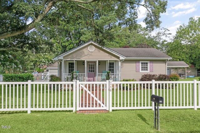 216 S Faison Ave, Faison, NC 28341 - view of front of house featuring covered porch, a fenced front yard, and a gate
