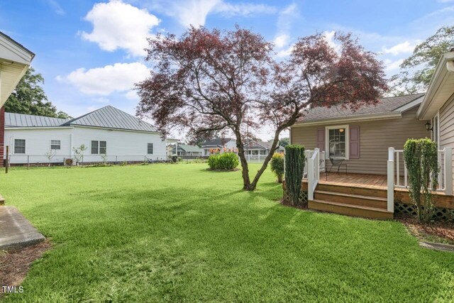 216 S Faison Ave, Faison, NC 28341 - view of green lawn featuring a wooden deck