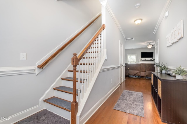 701 Laurel Spring Dr, Fuquay Varina, NC 27526 - staircase with wood finished floors, ornamental molding, and a ceiling fan