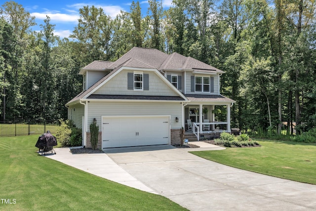 1725 River Club Way, Franklinton, NC 27525 - view of front facade featuring covered porch, driveway, brick siding, and a shingled roof