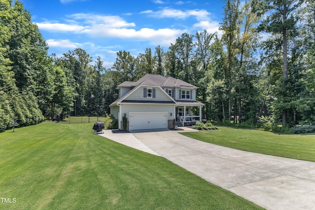 1725 River Club Way, Franklinton, NC 27525 - view of front facade with covered porch, driveway, and a garage