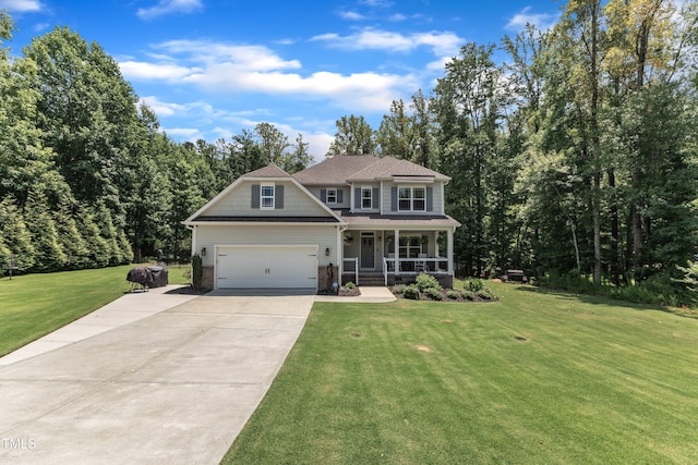 1725 River Club Way, Franklinton, NC 27525 - view of front facade with a porch, driveway, a front yard, and a garage