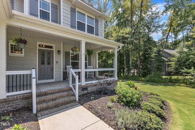 1725 River Club Way, Franklinton, NC 27525 - property entrance with a porch and a lawn