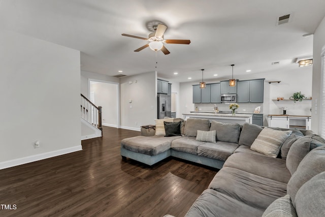 1725 River Club Way, Franklinton, NC 27525 - living room featuring a ceiling fan, stairway, recessed lighting, and dark wood finished floors