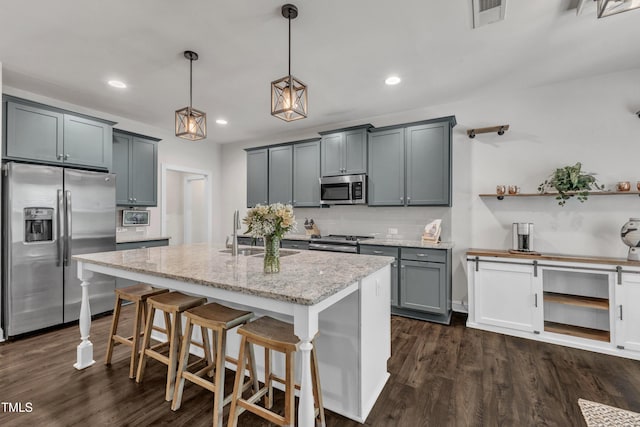 1725 River Club Way, Franklinton, NC 27525 - kitchen featuring stainless steel appliances, recessed lighting, dark wood-style floors, light stone countertops, and tasteful backsplash