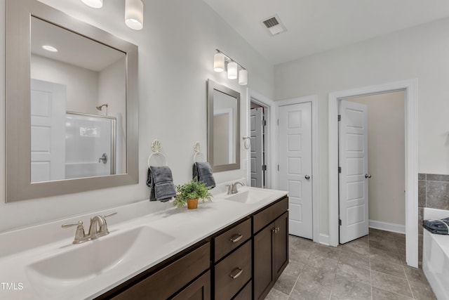 1725 River Club Way, Franklinton, NC 27525 - full bathroom featuring a bath, double vanity, and a shower