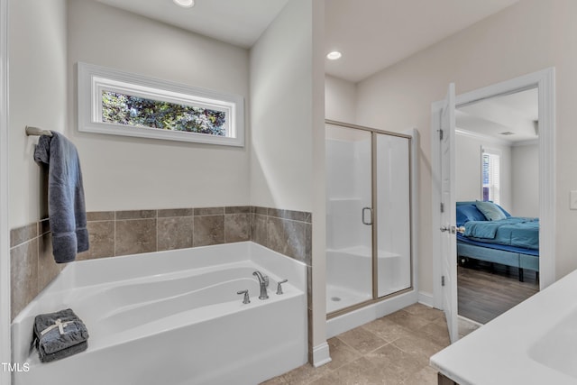 1725 River Club Way, Franklinton, NC 27525 - ensuite bathroom with a stall shower, a garden tub, tile patterned floors, and recessed lighting