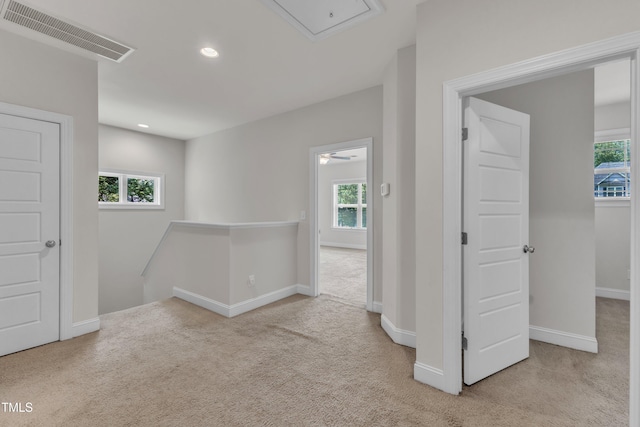 1725 River Club Way, Franklinton, NC 27525 - hall with an upstairs landing, carpet floors, plenty of natural light, and recessed lighting