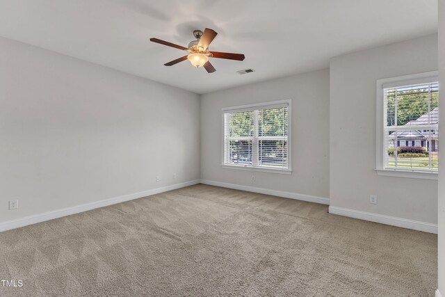 1725 River Club Way, Franklinton, NC 27525 - empty room with plenty of natural light, a ceiling fan, and carpet